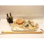 Miscellaneous items, including walking sticks, bottles, collar box, boomerang, large silver plated