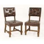 A pair of early Victorian oak and leather chairs, with spiral twist legs