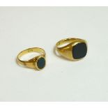 A gentleman's 18ct gold onyx signet ring, by Charles Green, and a ladies gold onyx signet ring