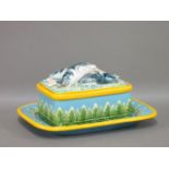 A modern George Jones style majolica sardine dish, cover and platter, 29cm wide