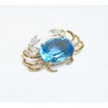 A blue topaz and diamond set crab brooch/pendant, marked 14k 585