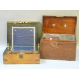 A Victorian walnut and metal bound writing slope, and a George III mahogany tea caddy with star