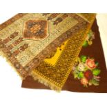 A Persian carpet, 145 x 190cm approximately, another golden ground, and a tapestry hanging with