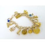 A 9ct gold charm bracelet, with assorted gold charms, 39.8g approximately