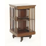 An Edwardian mahogany revolving bookcase, 81cm high