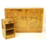 An Art Deco walnut cupboard, with a cupboard enclosing four slides and five shelves, 140cm, and a
