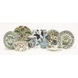Various 19th and 20th century Iznik pieces, including a pair of dishes with vine leaf borders,