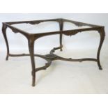 A large 19th century French table base, with shaped undertier, on cabriole legs