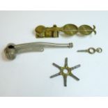 A set of sovereign scales, a whistle, and watch keys