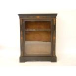 A 19th century ebonised pier cabinet, with decorative inlay