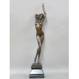 A reproduction bronze figure of a semi-nude woman, marked to base Vitaleh