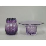 A Whitefriars amethyst glass bowl, 24cm diameter, and a Whitefriars amethyst glass jar and cover,