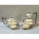 A matched four piece silver teaset, by Thomas Bradbury & Sons, London, 1909, 1910 and Sheffield