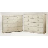 Two similar painted pine chests of drawers, each with two short and three long drawers, with knob