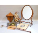 A Victorian walnut blotter, with oval porcelain portrait of a lady, a toilet mirror, Mr Punch door