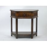 An Old Charm oak credence table, with single drawer, 74.5cm wide