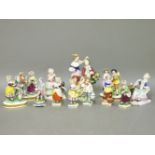 Twenty-one late 19th/early 20th century miniature china figures and groups, tallest 9.5cm high,