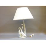 A Nao table lamp and shade, formed as two geese by a tree trunk, 74cm high overall