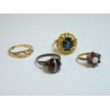A 9ct gold opal and garnet cluster ring, a blue paste ring tested as approximately 18ct gold, a