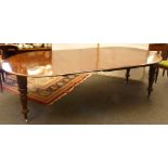 A Victorian mahogany extending dining table, complete with two extra leaves, 250cm extended, 115cm