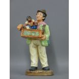 A Royal Doulton figure, 'Organ Grinder'