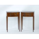 A pair of inlaid mahogany bedside chests, having two drawers on tapering legs, 45cm wide