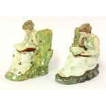 A pair of Staffordshire pearlware figures of literature, circa 1800, each as a girl seated by a