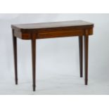 A George III strung and crossbanded mahogany fold over card table, 90cm wide