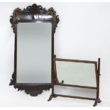 A George III style fret work wall mirror, 100cm high, and a toilet swing mirror