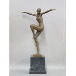 A reproduction bronze of an Art Deco style figure, on marble base