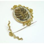 A Victorian memorial gold swivel brooch, frame broken, tested as approximately 9ct gold