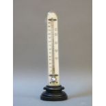 A 19th century ivory desk thermometer, gauge marked 'freezing to fever heat', inscribed verso '