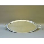 A Christofle silver plated oval two handled tray, stamped on handles, 66cm long