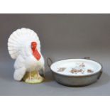 A Prince of Wares child's warming plate, and a Beswick figure of a turkey