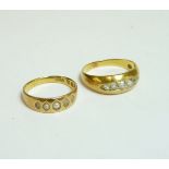 A five stone diamond tapered band ring, marked 18, and an 18ct gold split pearl ring