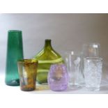 A green glass vase, and other coloured and clear glass vases