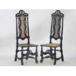 A pair of Charles II style bergère hall chairs