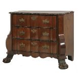 An 18th century Dutch walnut low commode, the shaped top over three long wavy drawers within