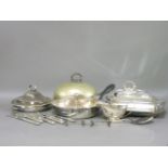 A collection of silver plated items, including three meat dish covers, flatware, cutlery, and entrée