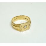 An 18ct gold diamond set signet ring, Birmingham 1929, finger size P LE