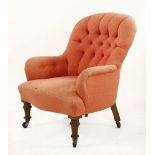 A Victorian upholstered chair, in pink damask on turned front legs