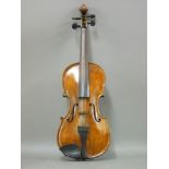 A violin, with a two piece back, labelled 'Joh Bapt Schweitzer, Fecit Anno 1850', together with a