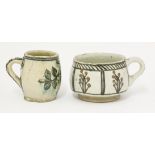 Two late 18th century mugs, one of depressed form with stylised leaves and iron red flowers, the
