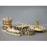 A davenport dressing table box and cover, a ring tree, a pin tray, an oval box and cover, a