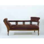A Victorian walnut chaise longue, with brown upholstery