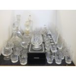 A quantity of cut glass decanters, and drinking glasses