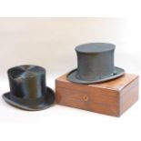 Two top hats, and a mahogany box
