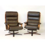 A pair of Swedish leather lounge chairs, with beechwood laminate frames