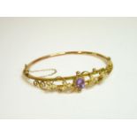 An Edwardian 9ct gold amethyst and split pearl bangle, Chester 1905
