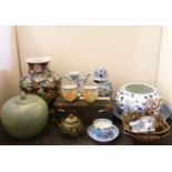 A group of miscellaneous ceramics, including a famille rose vase, a celadon jar, blue and white, two